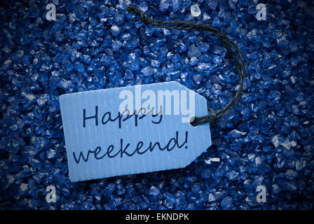 One Blue Label Or Tag With Black Ribbon On Blue And Purple Small Stones As Background With English Text Happy Weekend With Frame Stock Photo