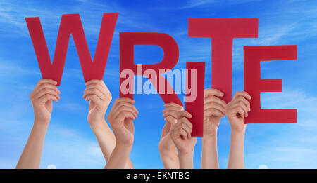 Many Caucasian People And Hands Holding Red Letters Or Characters Building The English Word Write On Blue Sky Stock Photo