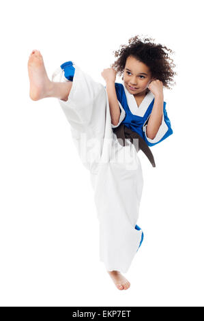 Young kid practicing karate Stock Photo