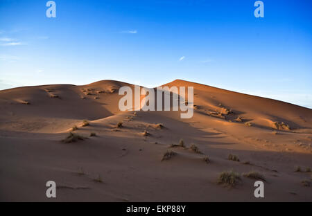 Several sand hill at Erg Chebbi in the Sahara desert. Ers are large dunes formed by wind-blown sand. Morocco