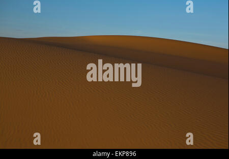 Several sand hill at Erg Chebbi in the Sahara desert.  Ers are large dunes formed by wind-blown sand. Morocco Stock Photo