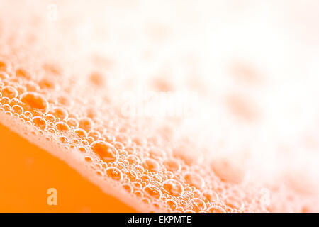 orange water drops close up Stock Photo