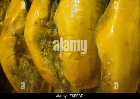 Legs of cured meat hanging at a market, Extremadura, Spain Stock Photo