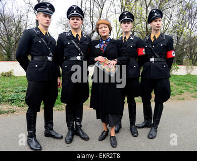 Shooting of the film about Czechoslovak film star Lida Baarova starts in the Olsany cemetary, Prague, Czech Republic, April 13, 2015. Pictured centre Simona Stasova. The lead role in the prepared Czech film about actress Baarova, who was mistress of Nazi Germany´s Propaganda Minister Joseph Goebbels before the war, will play Slovak actress Tana Pauhofova. Stock Photo