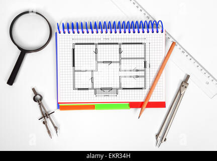 notepad with blueprint on the desktop engineer Stock Photo