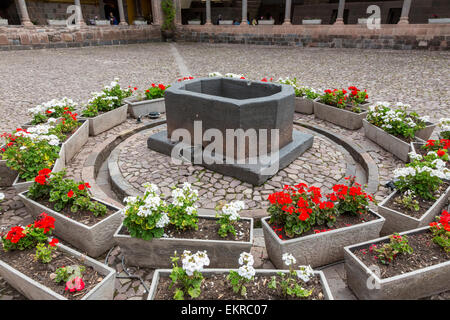 Peru, Cusco.  Interior of Santo Domingo Courtyard Showing Watering Basin from Qorikancha Inca Temple of the Sun. Stock Photo