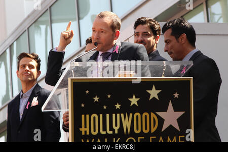 New Kids on the Block's star unveiling ceremony on the Hollywood Walk of Fame  Featuring: Joey McIntyre,Donnie Wahlberg,Danny Wood Where: Hollywood, California, United States When: 09 Oct 2014 Stock Photo