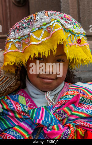 Peru, Cusco.  Young Quechua Girl in Traditional Dress. Stock Photo