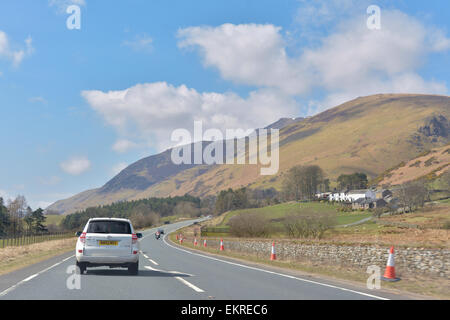 car driving along the A66 in the Northern Lakes heading towards Keswick, Lake District, Cumbria, England, UK Stock Photo