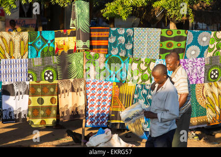 A clotth stall at an African market on the roadside in Ckiwawa, Malawi, Africa. Stock Photo