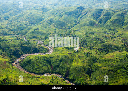 Looking down on deforested forest slopes from the air, being replaced by farmland for subsistence agriculture in Malawi. The country is suffering rapid deforestation, to provide both land for farming, and for making charcoal, the main cooking fule in malawi. Stock Photo