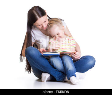 Mother is reading book with her daughter Stock Photo