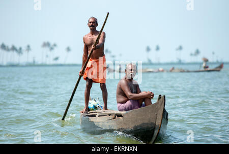 Fishermen on the Vembanad Lake in Kumarakom, Kerala India Stock Photo