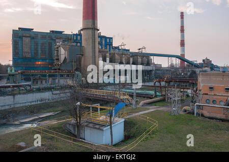 CHP with high chimneys in Poland at dusk Stock Photo