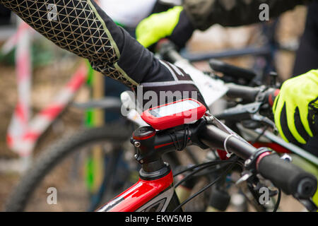 Modern electronic gps device attached to bicycle handlebar Stock Photo