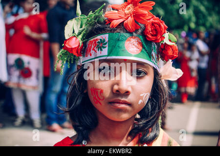 Dhaka, Bangladesh. 14th Apr, 2015. People welcome Bengali new year 1422. They do various activities to celebrate the day. The night before the new year, they lit sky lanterns and sent lamps into the water. In the morning they hold cultural rallies, wear festive dresses and participate in many functions to celebrate the day. Credit:  Belal Hossain Rana/Pacific Press/Alamy Live News Stock Photo