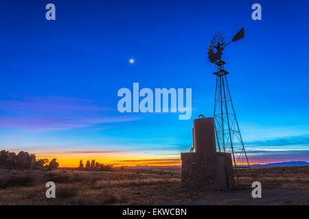 December 24, 2014 - The waxing crescent moon beside Mars (to the left of the moon) and above Venus (low in the twilight), framed Stock Photo