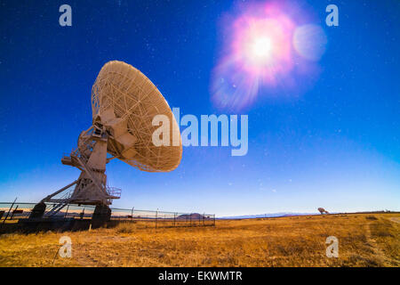 Dedember 13, 2013 - One of the 27 antennas of the Very Large Array (VLA) radio telescope complex in New Mexico (with others in t Stock Photo