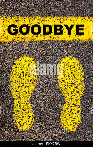 Goodbye message. Conceptual image with yellow paint footsteps on the road in front of horizontal line over asphalt stone background. Stock Photo
