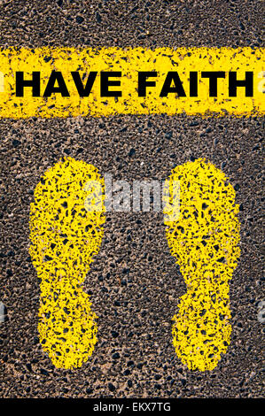 Have Faith message. Conceptual image with yellow paint footsteps on the road in front of horizontal line over asphalt Stock Photo