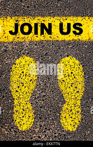 Join Us message. Conceptual image with yellow paint footsteps on the road in front of horizontal line over asphalt Stock Photo