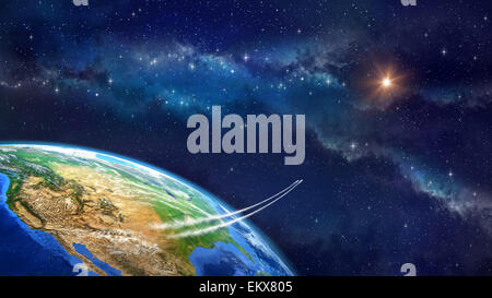 Planet earth in outer space. Spacecrafts lifting off from USA soil. Elements of this image furnished by NASA Stock Photo