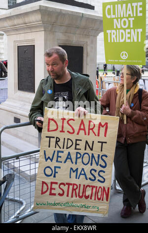 Whitehall, London, UK. 13th April, 2015. Vote Out Trident, an evening of Party and Protest against the renewal of Trident outside the Ministry of Defence building. Credit:  Paul Mendoza/Alamy Live News