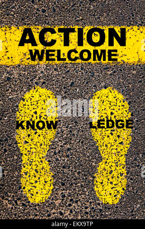 Turn Knowledge into Action message. Conceptual image with yellow paint footsteps on the road in front of horizontal line Stock Photo