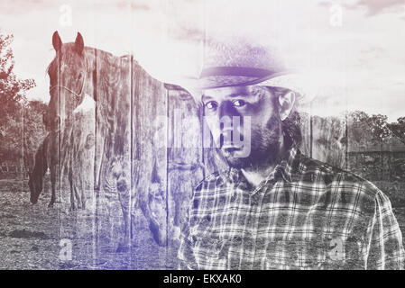 Bearded Cowboy Farmer wearing Straw Hat on Western American Horse Ranch, Double Exposure Image. Stock Photo