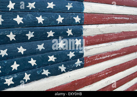 Hand painted American flag on rustic wood. Stock Photo