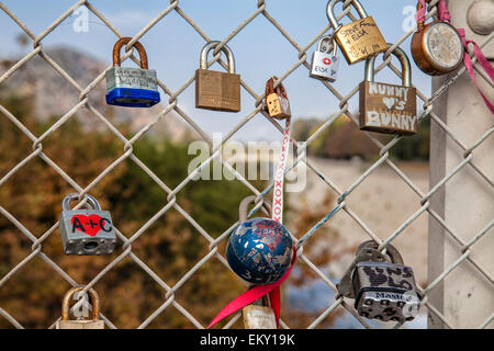 Love Locks adorn the Sunnynook Pedestrian Bridge over the Los Angeles River along the Glendale Narrows Stock Photo
