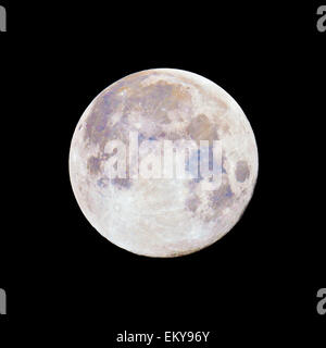 Full moon in color against black night sky Stock Photo