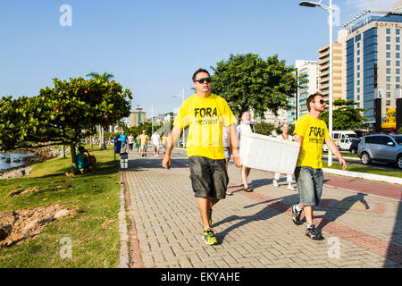 Protesters walking on Beira Mar Norte Avenue in the manifestation for the impeachment of Brazilian president. Stock Photo