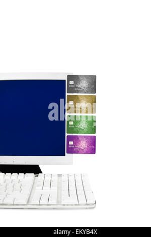 Credit cards and  bank cards on a computer with a blank screen for copy space Stock Photo