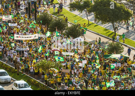 Protesters walk on Beira Mar Norte Avenue in the manifestation for the impeachment of Brazilian president. Stock Photo