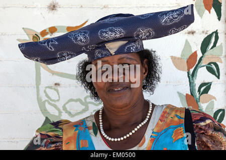 Local Herero woman wearing typical headdress and dress, portrait, township, Katutura, Windhoek, Namibia Stock Photo