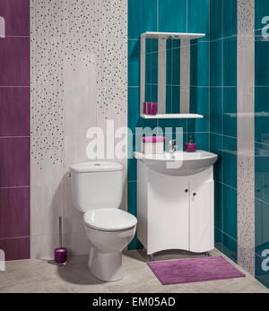 detail of a modern bathroom with sink, cabinet and toilet Stock Photo