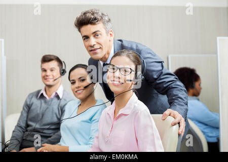 Manager With Team In Call Center Stock Photo