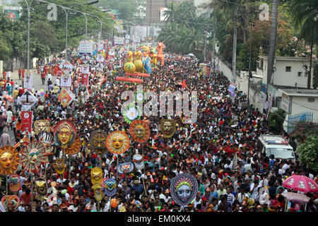 Dhaka, Bangladesh. 14th April, 2015. Revellers attend a rally in celebration of the Bengali New Year or “Pohela Boishakh” in Dhaka on April 14, 2015. The Bengali calendar or Bangla calendar is a traditional solar calendar and the year begins on Pohela Boishakh, which falls on April 14 in Bangladesh. Credit:  Mamunur Rashid/Alamy Live News Stock Photo