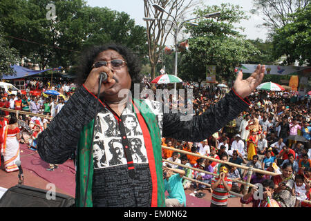 Dhaka, Bangladesh. 14th April, 2015. A singer performs at Ramna Perk to  celebration of the Bengali New Year or “Pohela Boishakh” in Dhaka on April 14, 2015. The Bengali calendar or Bangla calendar is a traditional solar calendar and the year begins on Pohela Boishakh, which falls on April 14 in Bangladesh. Credit:  Mamunur Rashid/Alamy Live News Stock Photo