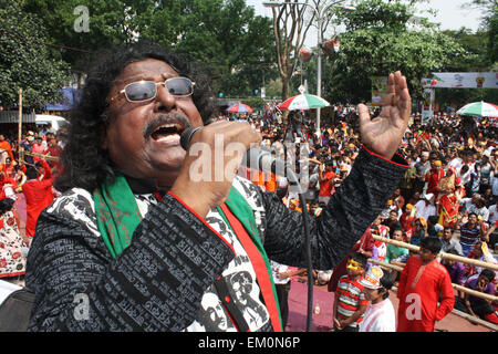 Dhaka, Bangladesh. 14th April, 2015. A singer performs at Ramna Perk to  celebration of the Bengali New Year or “Pohela Boishakh” in Dhaka on April 14, 2015. The Bengali calendar or Bangla calendar is a traditional solar calendar and the year begins on Pohela Boishakh, which falls on April 14 in Bangladesh. Credit:  Mamunur Rashid/Alamy Live News Stock Photo