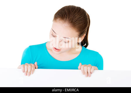 Portrait young happy woman with blank board Stock Photo