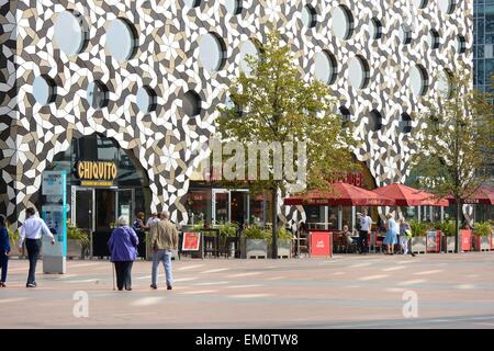 Modern buildings on the Greenwich Peninsular at Docklands in London. England. With people and terrace cafe Stock Photo