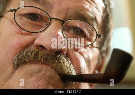 FILE - A file picture dated 09 October 2004 shows German Nobel Prize-winning novelist Guenter Grass in Frankfurt Main, Germany. Goettingen-based publishing house Steidl confirmed on 13 April 2015 the death of Guenther Grass. Photo: Boris Roessler/dpa Stock Photo