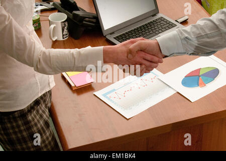 conclusion of a deal and happy business partners Stock Photo