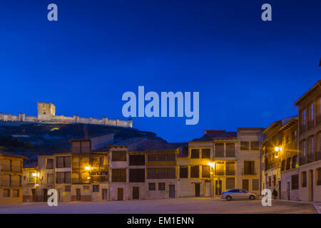 Castle and village at night. Stock Photo
