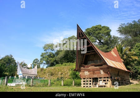 Traditional Batak house on Samosir island, Sumatra, Indonesia, Southeast Asia Stock Photo