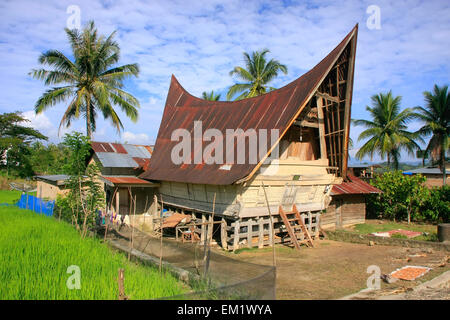 Traditional Batak house on Samosir island, Sumatra, Indonesia, Southeast Asia Stock Photo