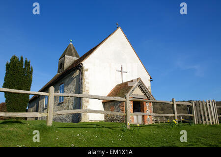 St Hubert's Church. Closeup of the church on the hill. Spring shot with daffodils in the foreground Stock Photo