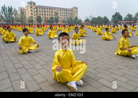 Youths train in Kung Fu at the Songshan Shaolin Temple Wuseng Tuan Training Center, Dengeng, Henan Province, China Stock Photo